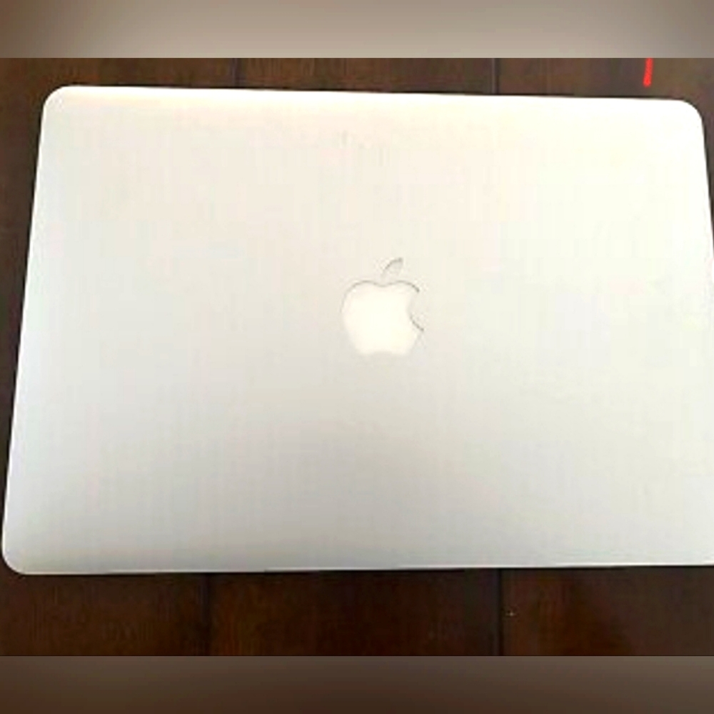 Two Apple Mac Book Air 13" perfect working condition, some scratches outer cover